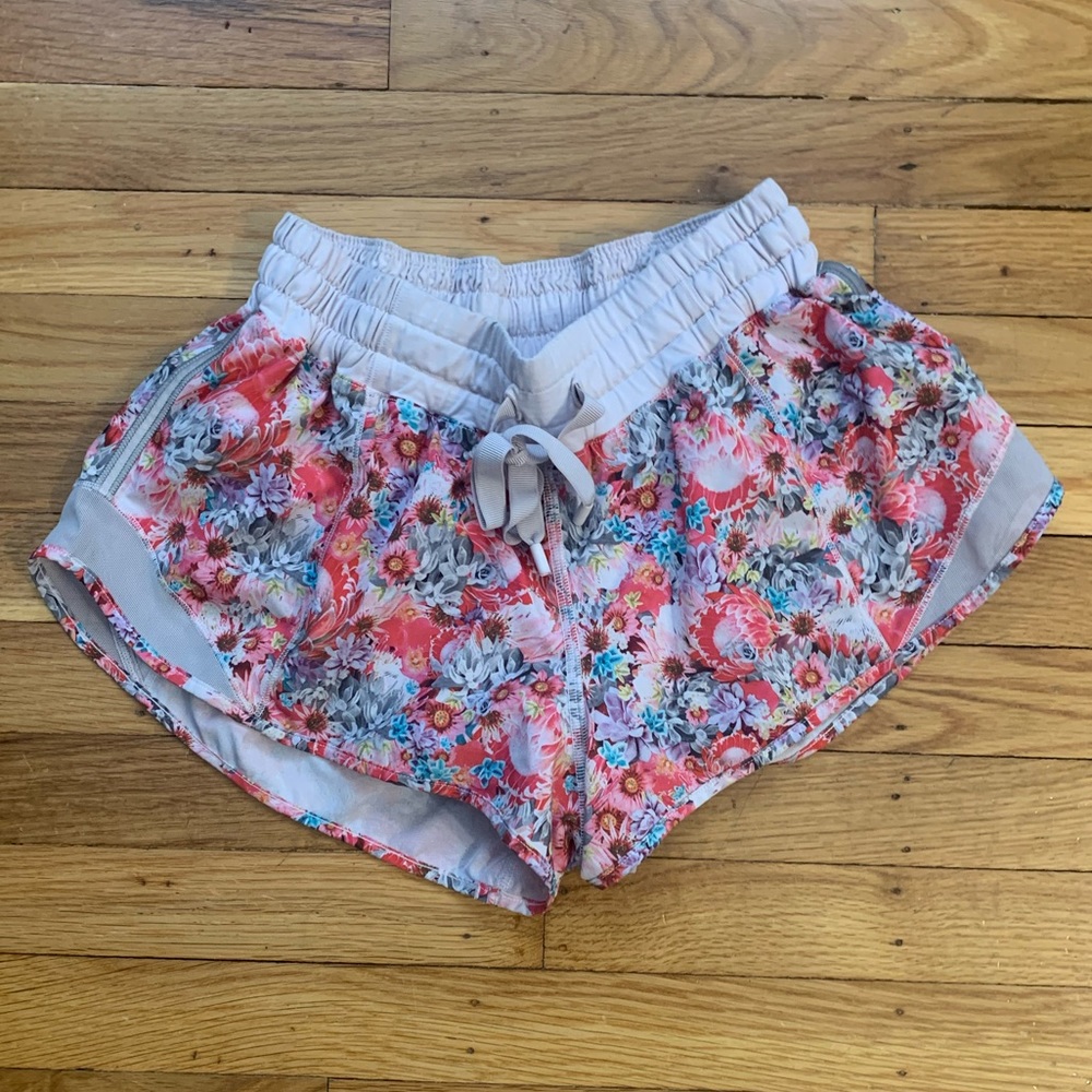 Cute pink floral athletic short. LuluLemon size 6. In excellent condition.